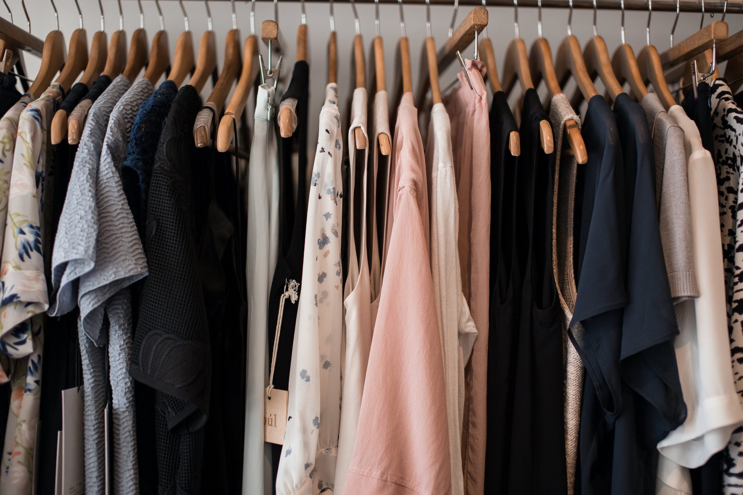 a rack of clothes hanging on a rack of clothes